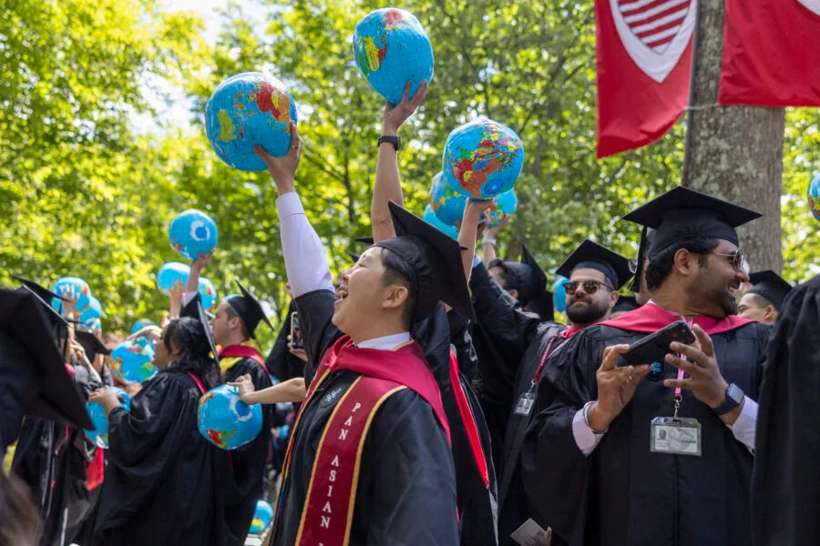 Kennedy School graduates show their pride. Photo: Scott Eisen