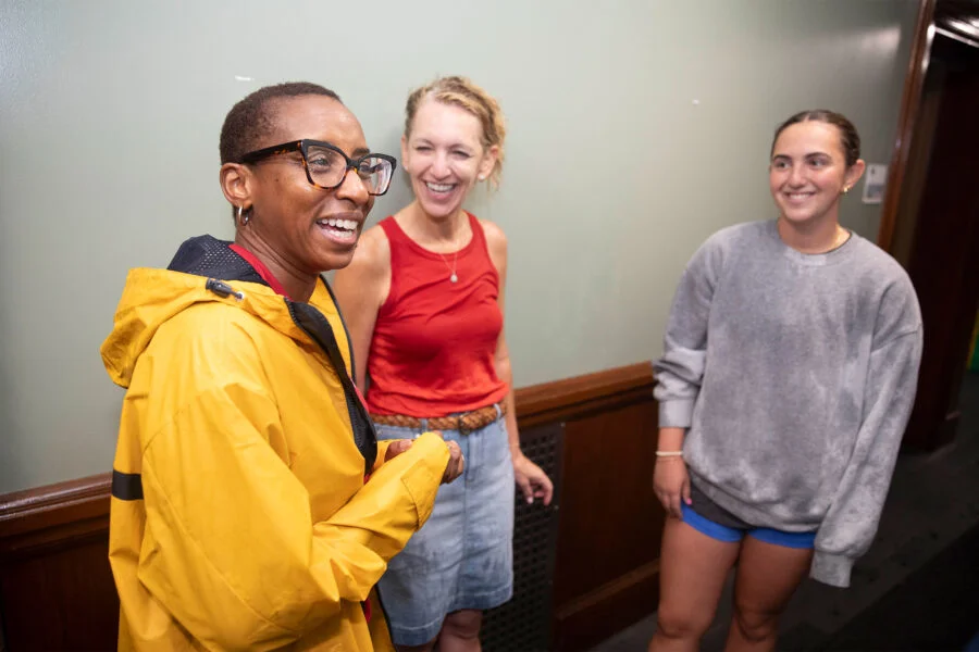 Harvard President Claudine Gay met with Lucy Berkman (right) and her mom, Andra, in Matthews Hall. Photo: Kris Snibbe