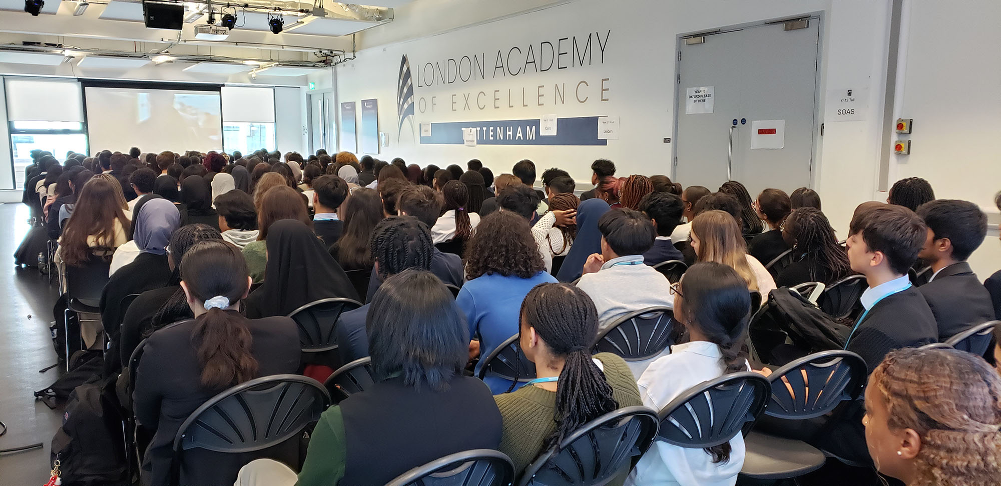 Year 12 students watch the video 'Harvard College Mission of Discovery' at the London Academy of Excellence, Tottenham, on 14 September 2023