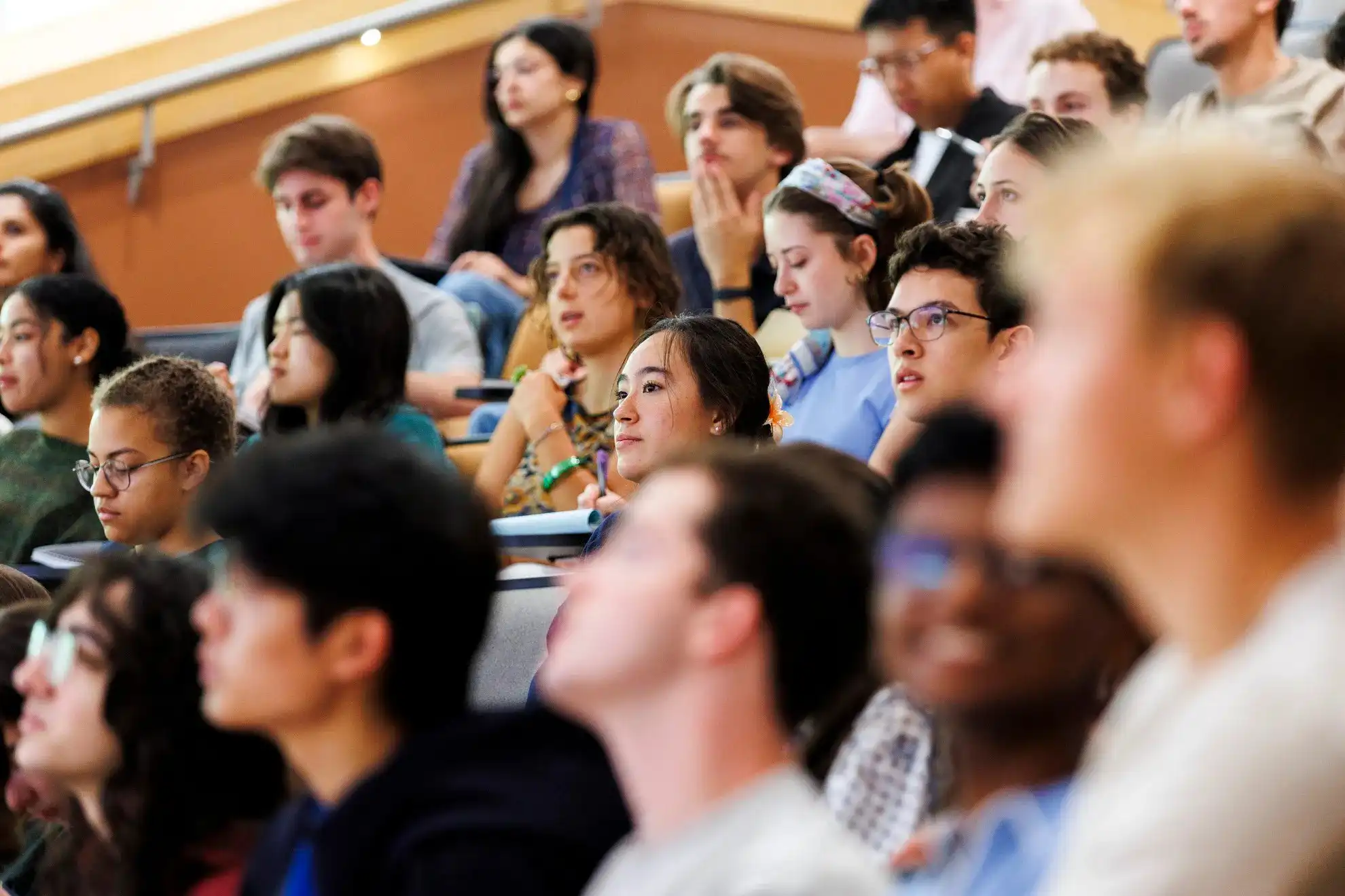 Students listen during the course “A Humanities Colloquium: from Homer to Joyce” in Boylston Hall’s Fong Auditorium. Stephanie Mitchell/Harvard Staff Photographer