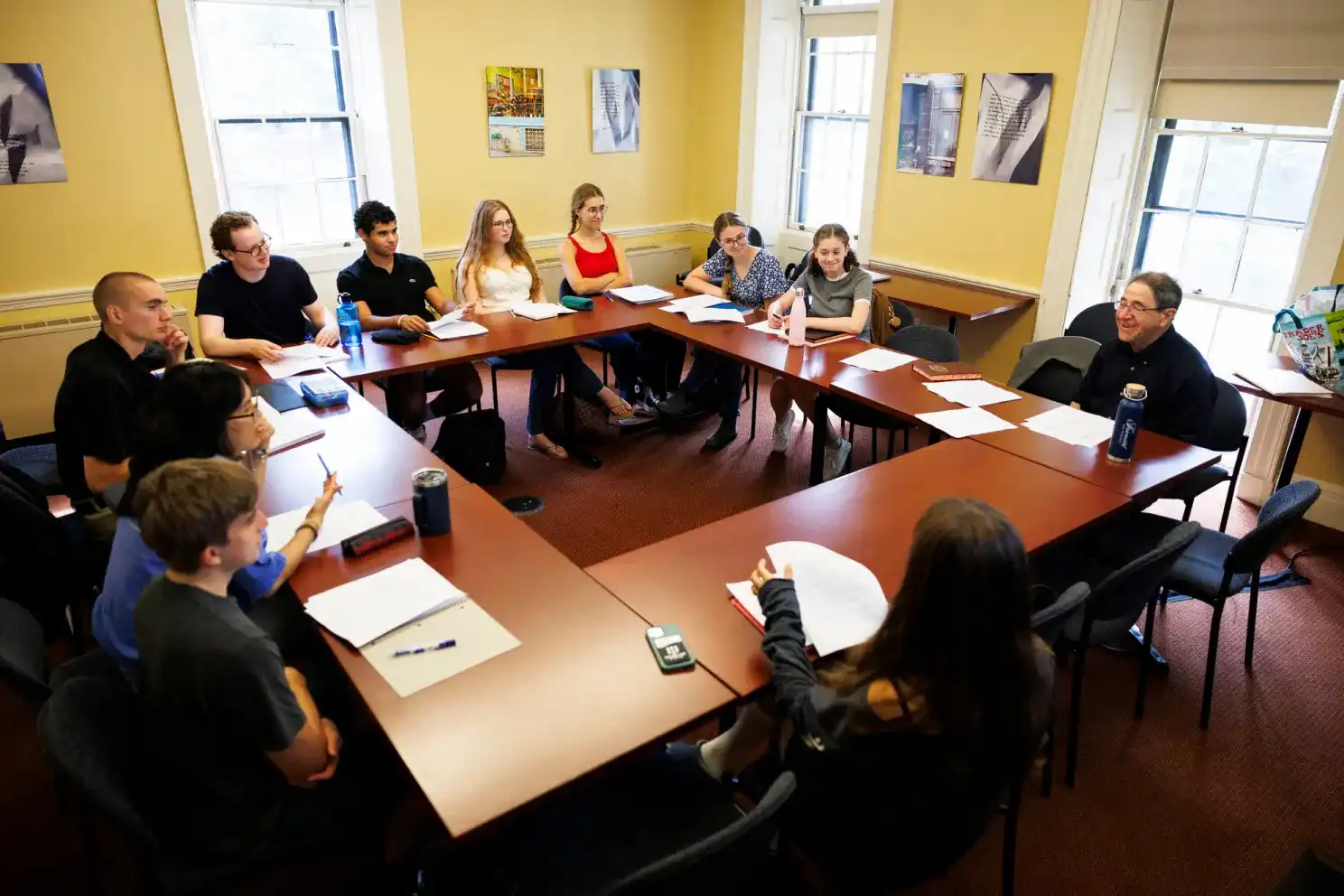 David Stern (far right) leads a class in the Dana-Palmer House. Niles Singer/Harvard Staff Photographer